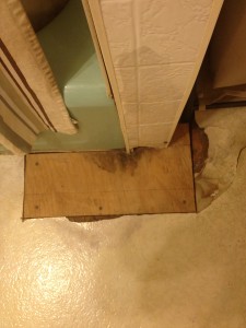 yup, a hole in the floor and a professional patch job